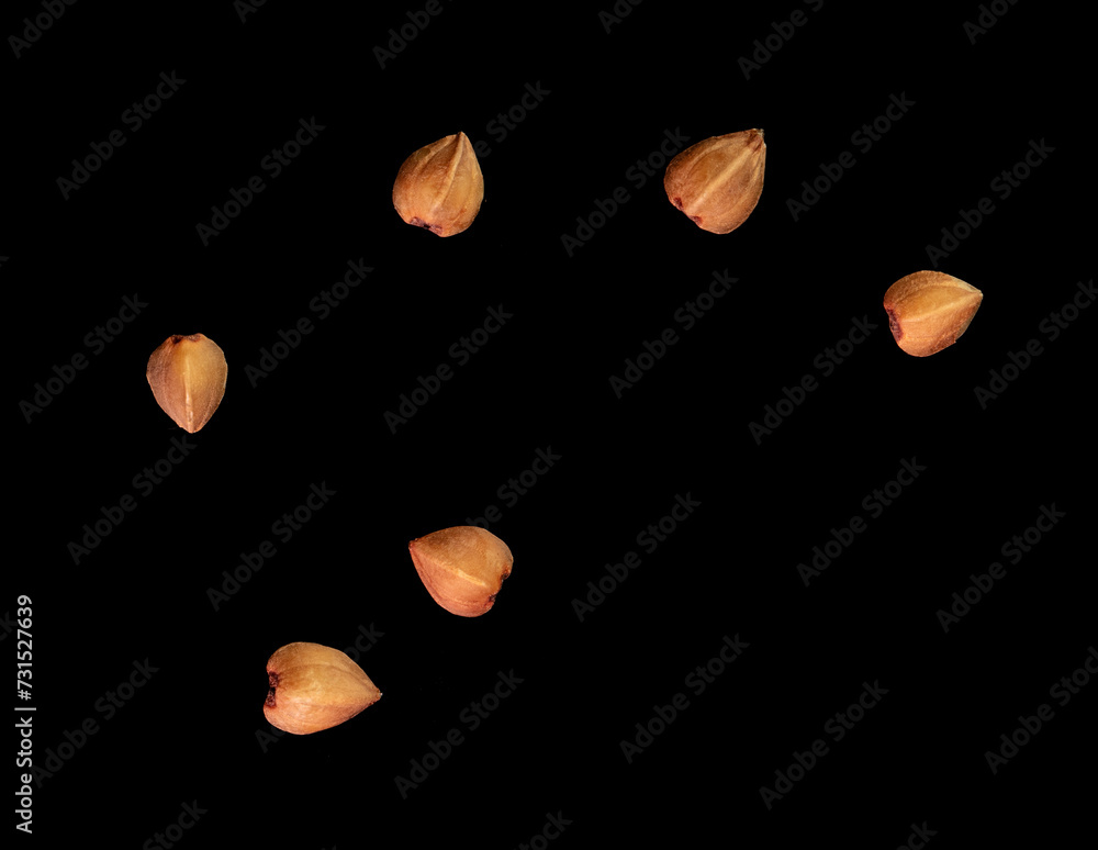 Buckwheat isolated on a black background. Close-up Buckwheat isolated on a black background. Close-up