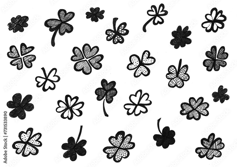 Set of clovers in doodle style. Black color on a white background. Shamrocks or four leaf clovers. Filling or contour drawing with decor. Decor of lines, dots, strokes, wavy lines and other ornaments. Set of clovers in doodle style. Black color on a white background. Shamrocks or four leaf clovers. Filling or contour drawing with decor. Decor of lines, dots, strokes, wavy lines and other ornaments.