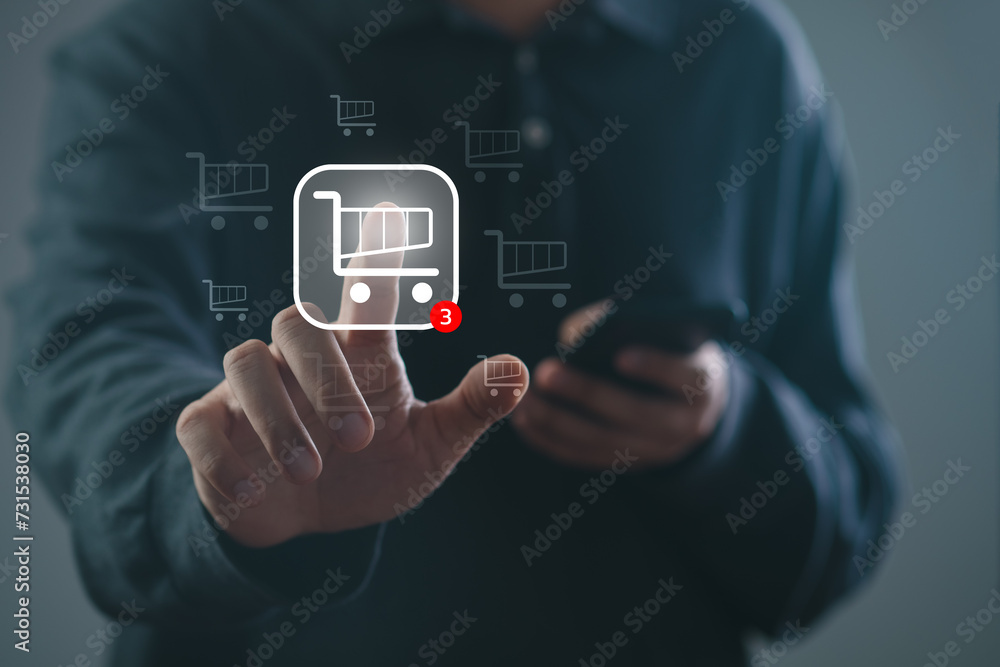 Man using smart phone with shopping cart icon. Online payment. men hand touching screen on smartphone and for online shopping. Payment Detail page display. Man using smart phone with shopping cart icon. Online payment. men hand touching screen on smartphone and for online shopping. Payment Detail page display.