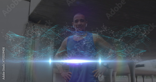 Image of glowing communication network over resting male athlete exercising outdoors
