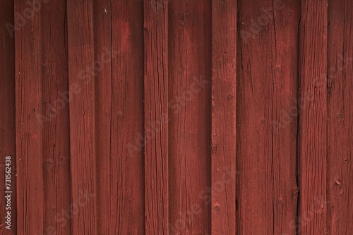 Obraz na plátně Closeup of boarded wall painted with traditional red paint.
