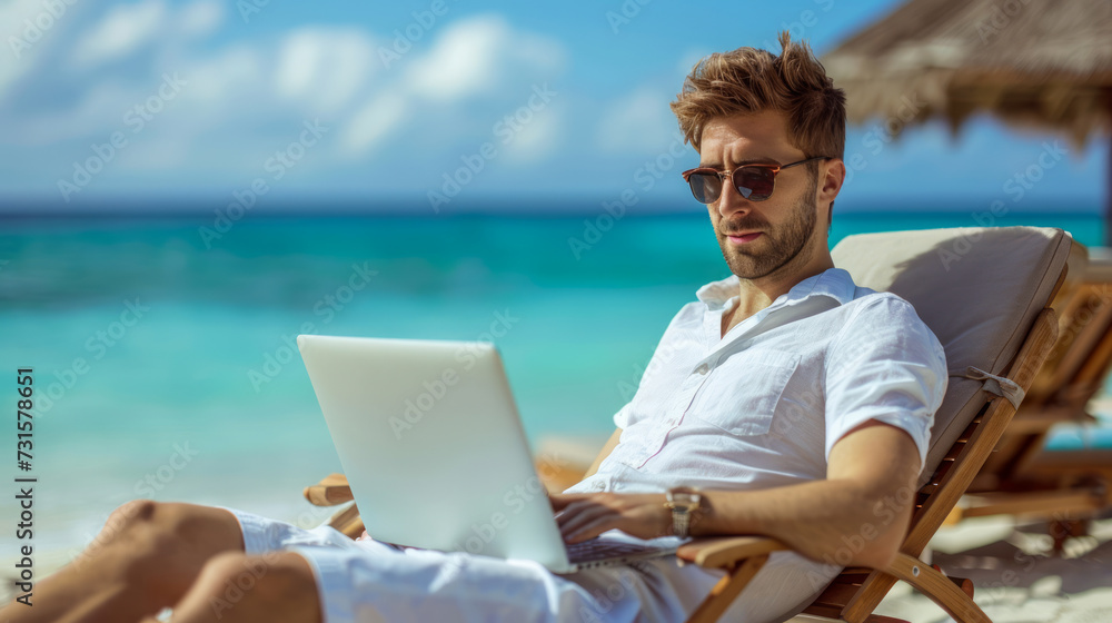 A man sits on a beach chair working on a laptop with the ocean in the background, suggesting a remote work lifestyle on vacation.  Ai generative