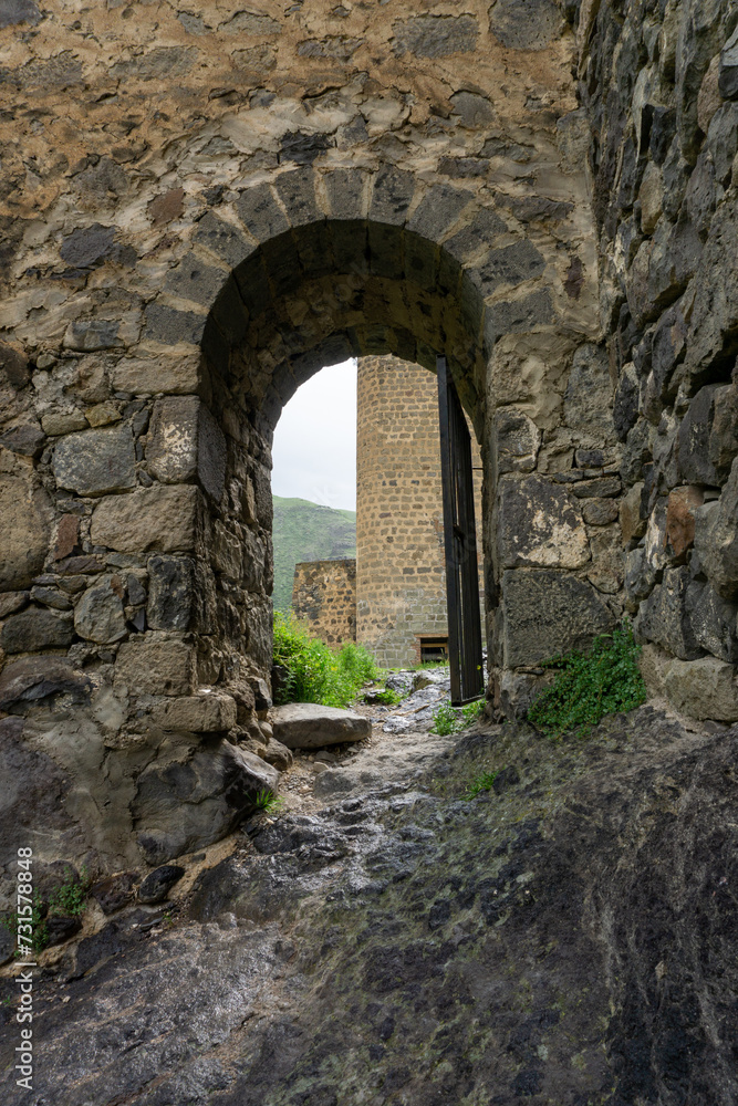 The gate to the tower. Khertvisi fortress. Defence towers and walls made from stone.