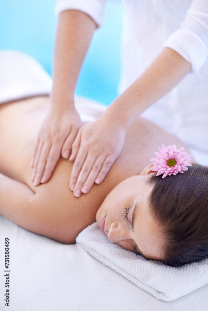 Relax, massage and woman at hotel pool with flower for health, wellness and luxury holistic treatment. Self care, peace and girl on table with masseuse for body therapy, sleep and calm spa service Relax, massage and woman at hotel pool with flower for health, wellness and luxury holistic treatment. Self care, peace and girl on table with masseuse for body therapy, sleep and calm spa service