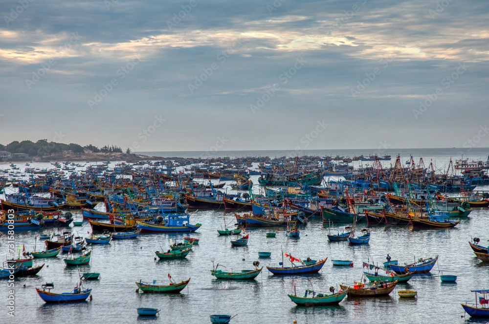 Fishing village in Mui Ne, Vietnam, Southeast Asia, Fisherboats and lokal market, early morning
