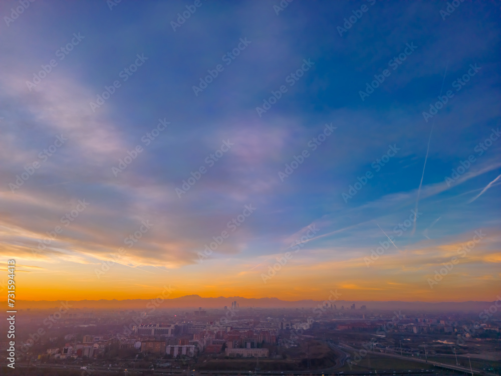 San Donato Milanese City in Italy with beautiful Sunset . Cityscape from drone. Italy, Lombardy, Milan, San Donato Milanese