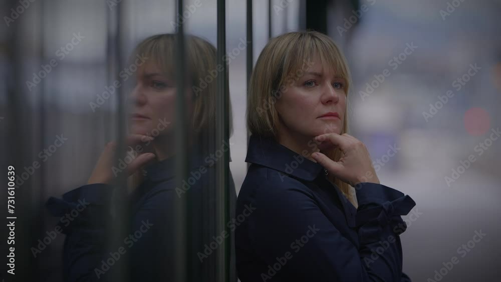 Sad Blond Woman Worried Thinking About Life Problems at Trainstation