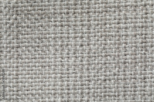 Texture of soft light grey fabric as background, top view