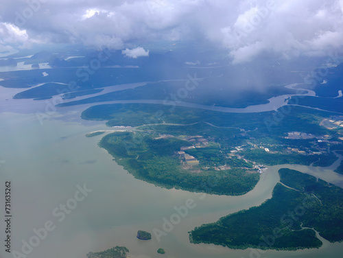 Aerial view flying over stunning tropical green islands Phang Nga Bay, Andaman Sea Thailand, seascape, green and blue, turquoise color, high angle view