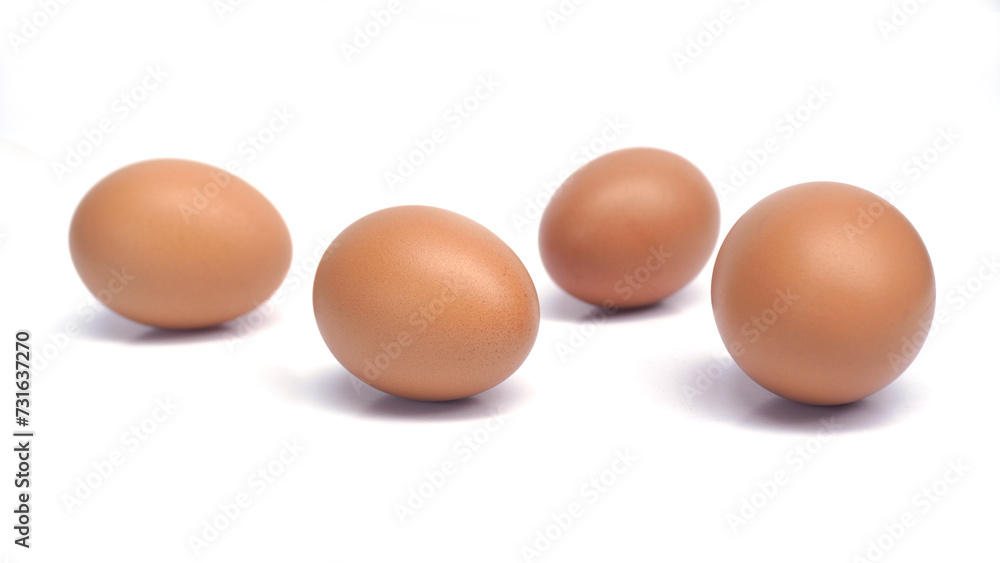 several brown chicken eggs on an isolated background several brown chicken eggs on an isolated background
