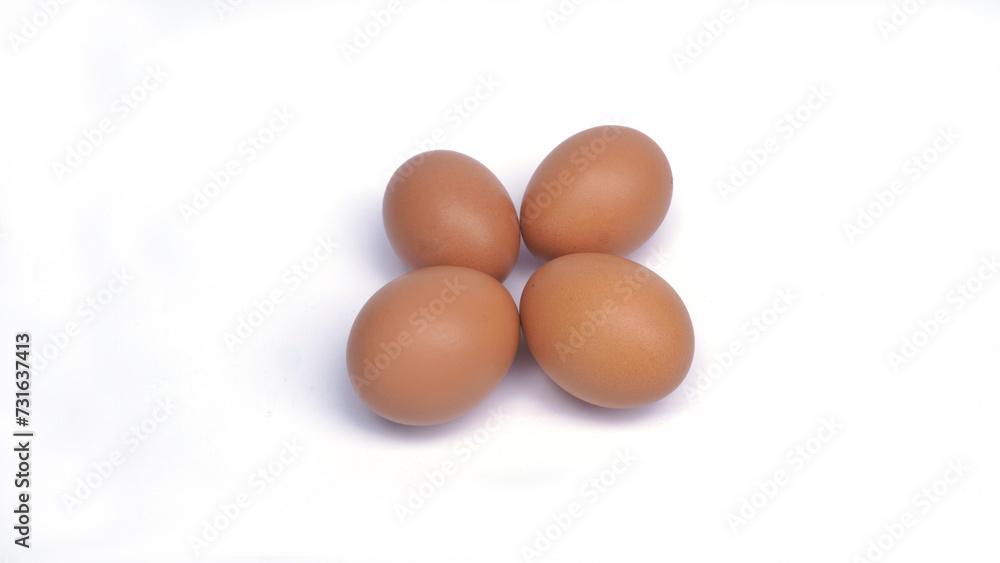 several brown chicken eggs on an isolated background several brown chicken eggs on an isolated background