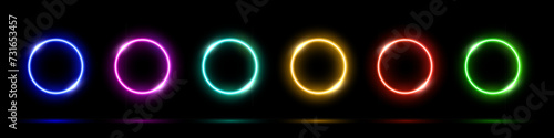 Glowing light neon abstract circles on black background. Color led round electric frames. Geometric vector illustration set. Empty blue, pink, green, purple, red, yellow rings art decoration design