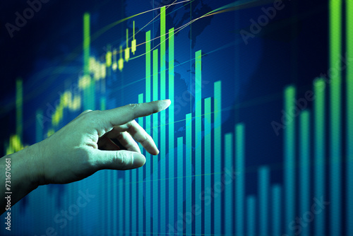 Businessman hand analysing financial stock market graph on board. Trading data index investment growth chart. Cryptocurrency and Forex Concept.