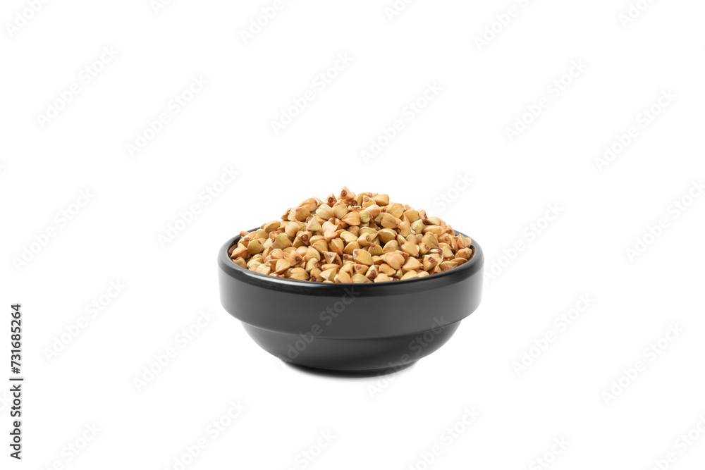 Green buckwheat in a bowl isolated on a white background. Superfood. Raw buckwheat porridge. Healthy vegan food, eco products, diet, organic. Green buckwheat in a bowl isolated on a white background. Superfood. Raw buckwheat porridge. Healthy vegan food, eco products, diet, organic.