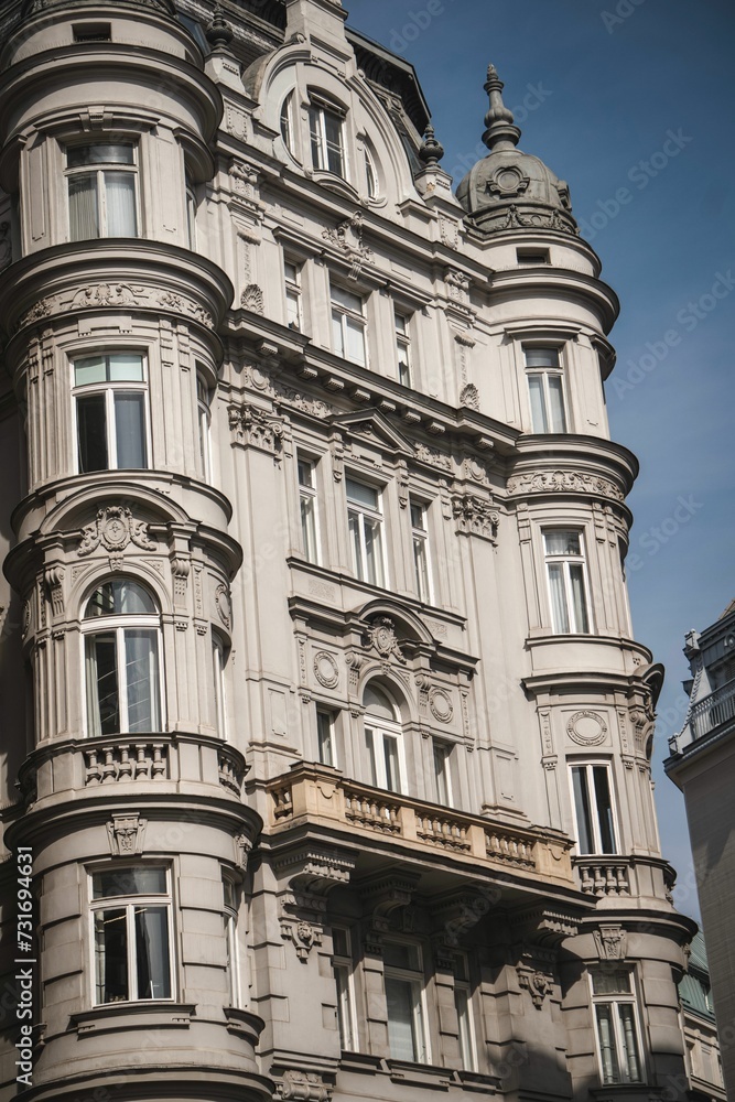 A vertical shot of a historic landmark building in Vienna, Austria