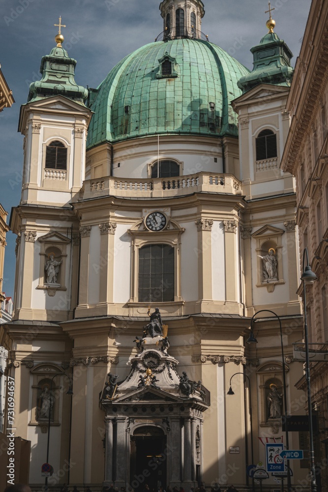 A vertical shot of a historic landmark building in Vienna, Austria