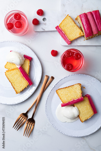 Obraz na płótnie Fresh loaf cake decorated with roasted rhubarb