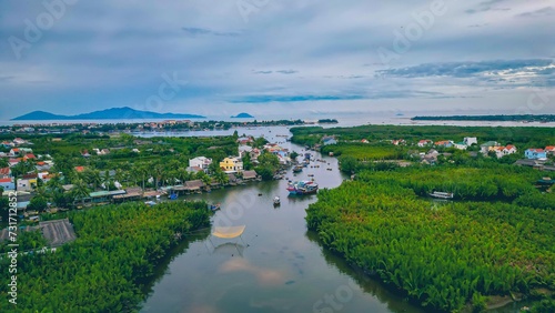 Aerial view, tourists are relax and experiencing a basket boat tour at the coconut water (mangrove palm ) forest in Cam Thanh village, Hoi An,Quang Nam,Vietnam