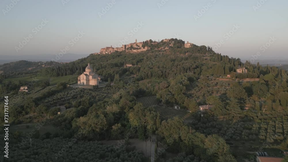 Aerial shot of olive groves and Montepulciano skyline at sunset, Montepulciano, Province of Siena, Tuscany Aerial shot of olive groves and Montepulciano skyline at sunset, Montepulciano, Province of Siena, Tuscany