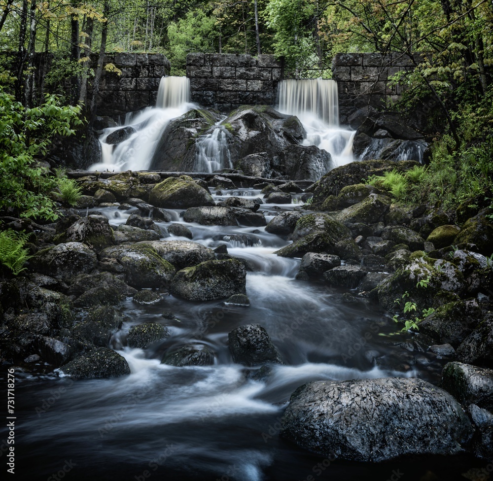 Obraz premium AI generated illustration of a picturesque river flowing underneath a rustic bridge, Finland