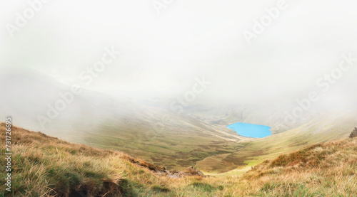 Amazing view in the national park Lake District in England on a foggy day in Autumn