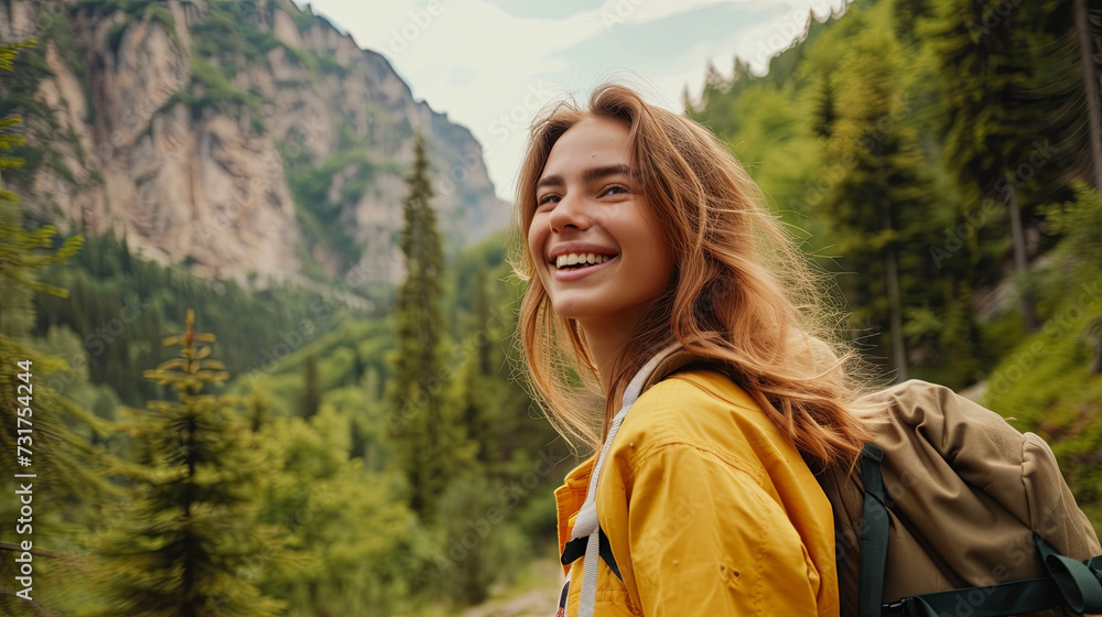 A young woman climbs the mountains and rejoices A young woman climbs the mountains and rejoices