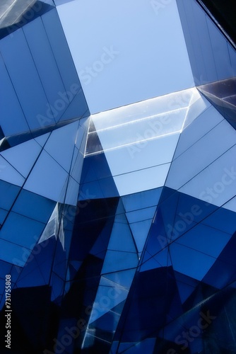 Abstract geometric structures made of blue glass