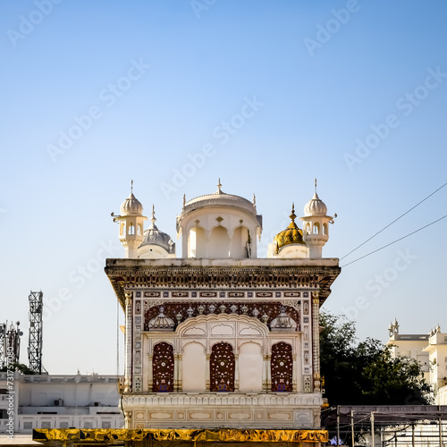 View of details of architecture inside Golden Temple - Harmandir Sahib in Amritsar, Punjab, India, Famous indian sikh landmark, Golden Temple, the main sanctuary of Sikhs in Amritsar, India photo