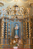 COURMAYEUR, ITALY - JULY 12, 2022: The baroque altar with the carved polychrome satatue of Madonna in the church Chiesa di San Pantaleone 