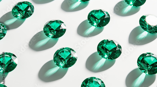 Luxurious pattern of emeralds on white background. Sparkle of gemstones. Precious stones jewelry concept. Generative AI