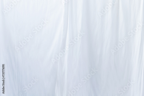 The fabric pattern is wavy white blurred abstract background