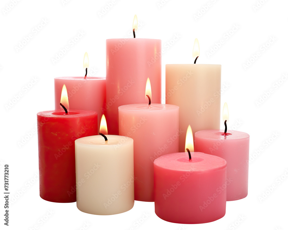 Assorted pillar candles in shades of pink and red with flames illuminated, cut out Assorted pillar candles in shades of pink and red with flames illuminated, cut out