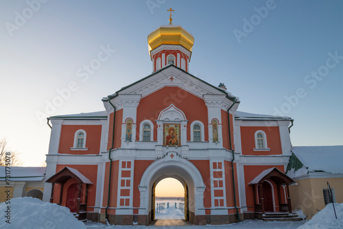 The ancient Church of Philip, Metropolitan of Moscow (1874) close-up on a January evening. Valdai Iversky Monastery. Novgorod region, Russia photo