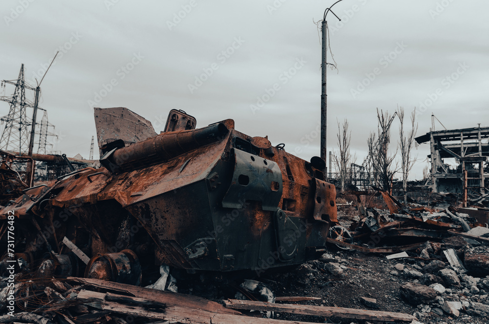 burnt tank and destroyed buildings of the Azovstal plant shop in Mariupol