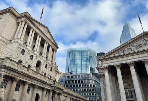 A partial view of the Bank of England and the Royal Exchange with modern buildings in the background skyline in the City of London, England. 
