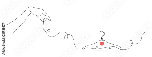 One continuous drawing of hanger with hand. Concept symbol for dry cleaning and laundry service in simple linear style. Editable stroke for elegance web banner. Doodle vector illustration