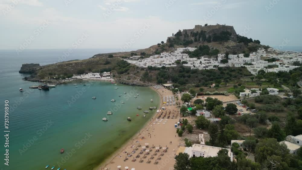 Drone view over a sandy beach in Rhodes, Greece Drone view over a sandy beach in Rhodes, Greece