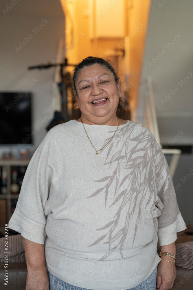 Fototapeta premium Portrait of smiling senior woman at home
