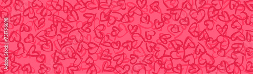dense pattern of hand-drawn heart doodles in various shades of pink © Vjom