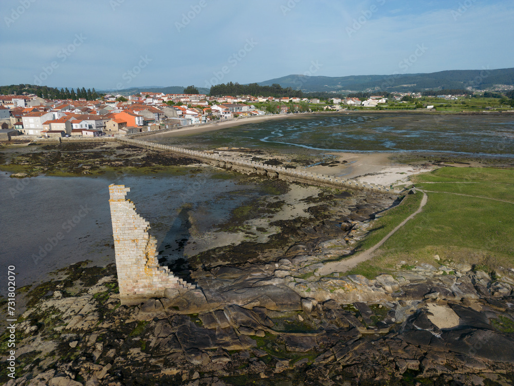 Aerial view of the San Sadurniño Tower and the San Tomé neighborhood and the San Sadurniño bridge in Cambados, Pontevedra