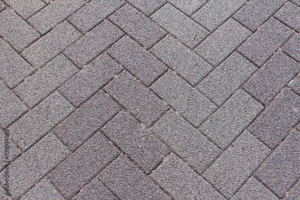 Texture of square cobblestone. Pattern of gray sidewalk tiles in the street. Gray square cobblestones close up. Texture of square cobblestone. Pattern of gray sidewalk tiles in the street. Gray square cobblestones close up.