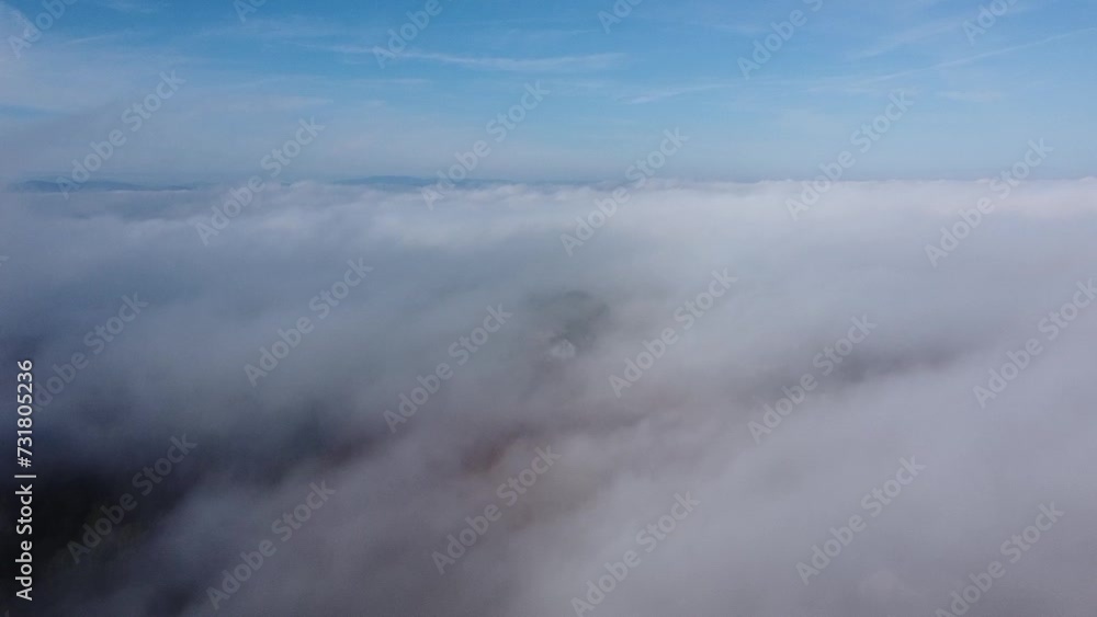 Drone view over soft clouds during daytime Drone view over soft clouds during daytime