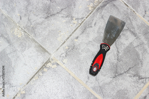 Restoration of inter-tile seams on the floor