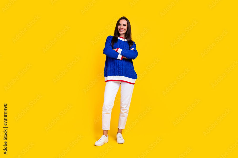 Full length size photo of confident attractive glad smiling woman folded hands experienced smm manager isolated on yellow color background Full length size photo of confident attractive glad smiling woman folded hands experienced smm manager isolated on yellow color background