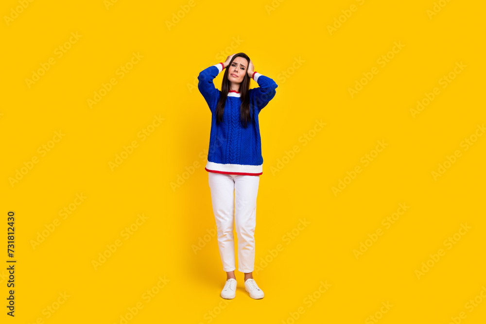 Full body length photo of mature hispanic woman brunette hair touch hands head feel pain migraine hurts isolated on yellow color background Full body length photo of mature hispanic woman brunette hair touch hands head feel pain migraine hurts isolated on yellow color background