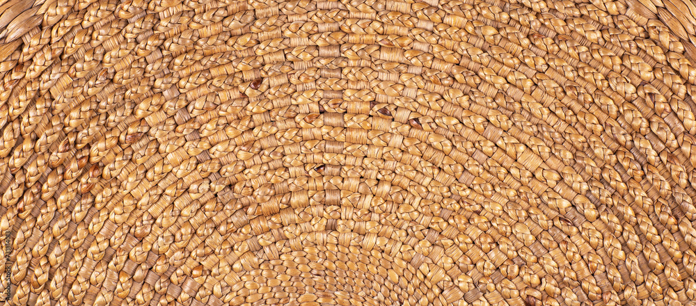 Naklejka premium background and texture of wicker straw surface