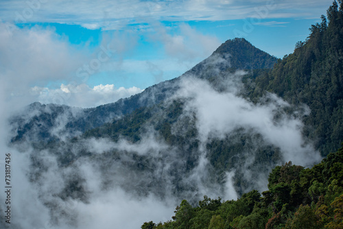 Mount lawu on foggy weather, showing layers of mountain highland in east java Indonesia 