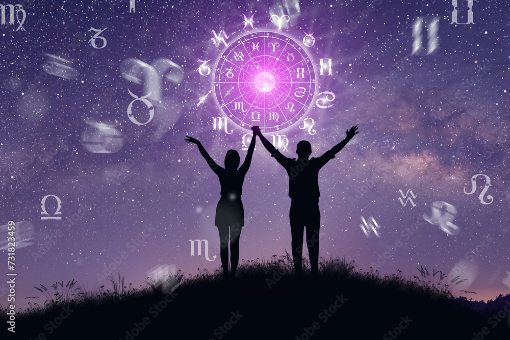 Astrological zodiac signs inside of horoscope circle. Couple singing and dancing over the zodiac wheel and milky way background. The power of the universe concept. Astrological zodiac signs inside of horoscope circle. Couple singing and dancing over the zodiac wheel and milky way background. The power of the universe concept.