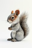 Cute grey squirrel with fluffy tail, a stuffed toy for children