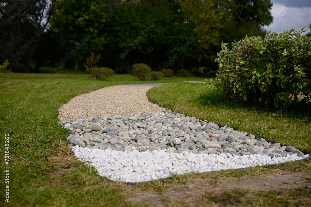 Barefoot path,with tactile eco elements with different textures in park. Prevention of flat feet. Touch trail,eco trail Barefoot path,with tactile eco elements with different textures in park. Prevention of flat feet. Touch trail,eco trail